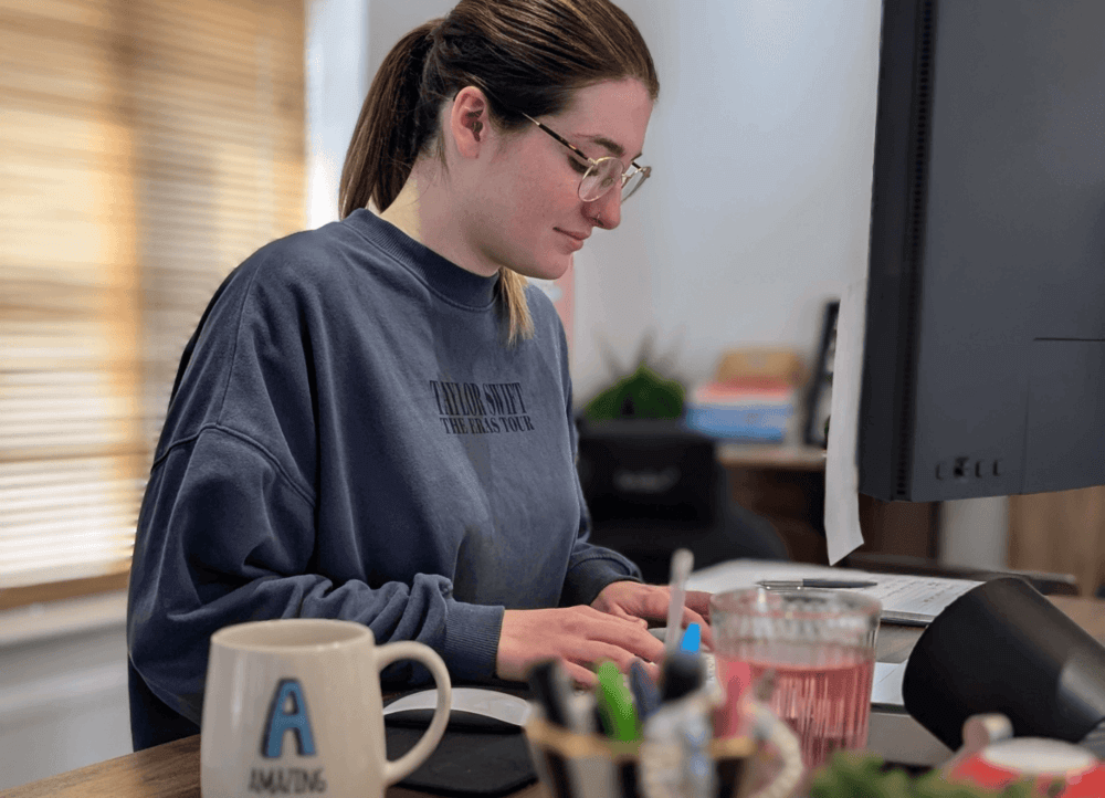 SEO degree apprentice Victoria working at her desk